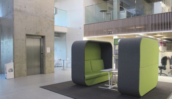 modern reception communal area with apple green accents