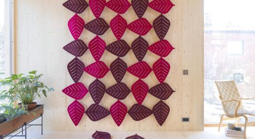 Studio shot of Airleaf acoustics along a wall, with 2 different shades of magenta.