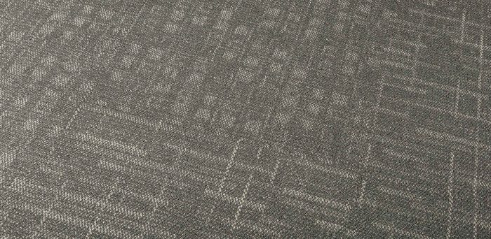 Detail shot from above of Madras and Oxford carpets.