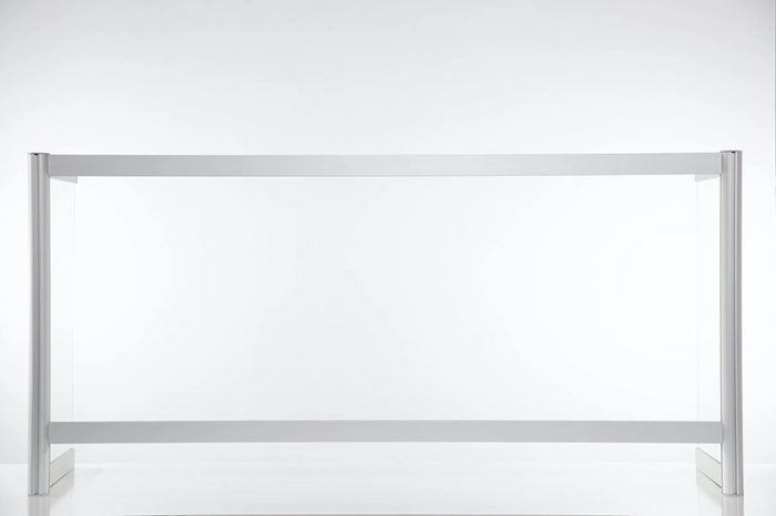 A large Counter Shield Wrap screen placed on a table.
