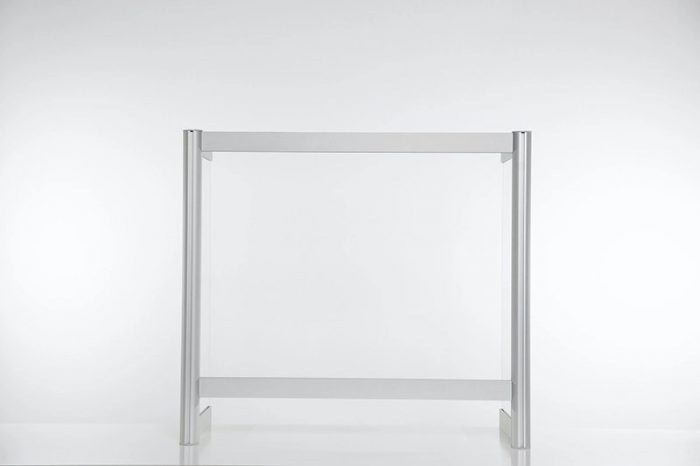 A small Counter Shield Wrap screen placed on a table.