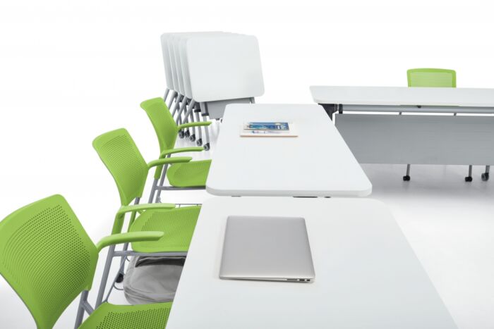 long white training tables with florescent green seating